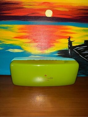 kate spade lime green hard shell eyeglass case with gold logo